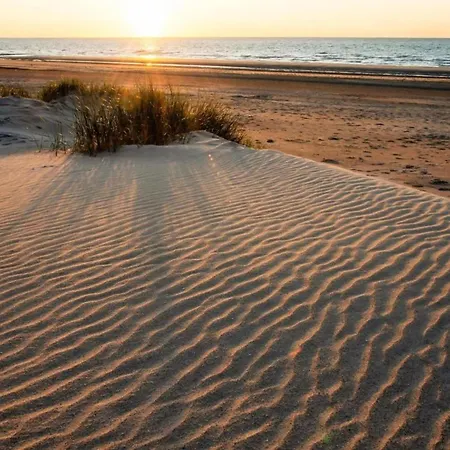 In By Scenic Beaches Lejlighed